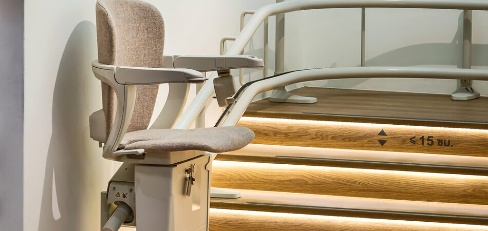 Stairlift,on,staircase,for,elderly,people,in,a,house.